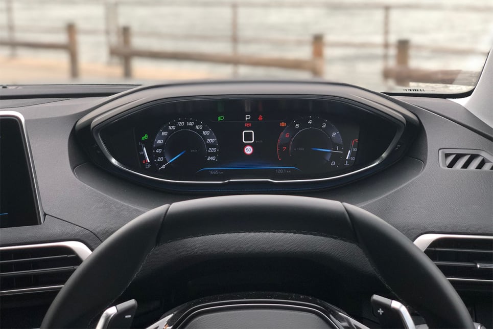 Behind the steering wheel is a 12.3-inch digital dashboard.