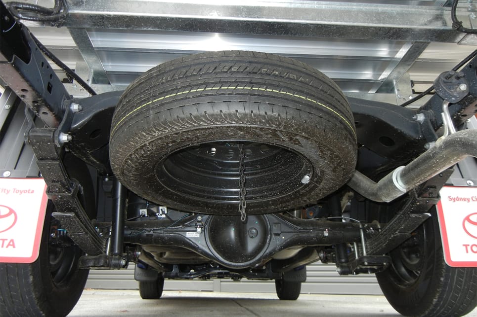 Underneath the tray is a full-size spare tyre.