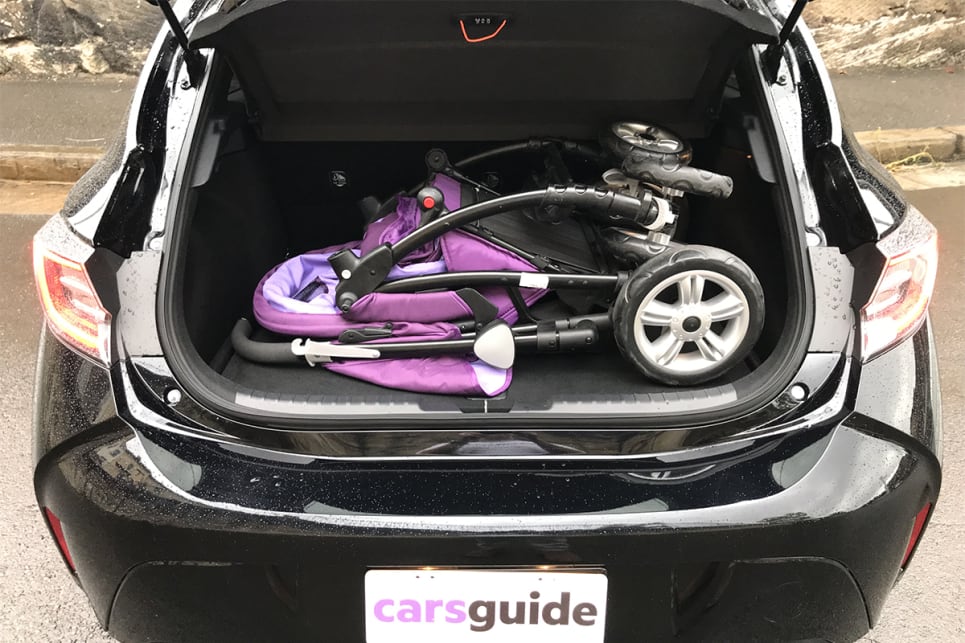 The CarsGuide pram scraped into the boot by the skin of its wheels.