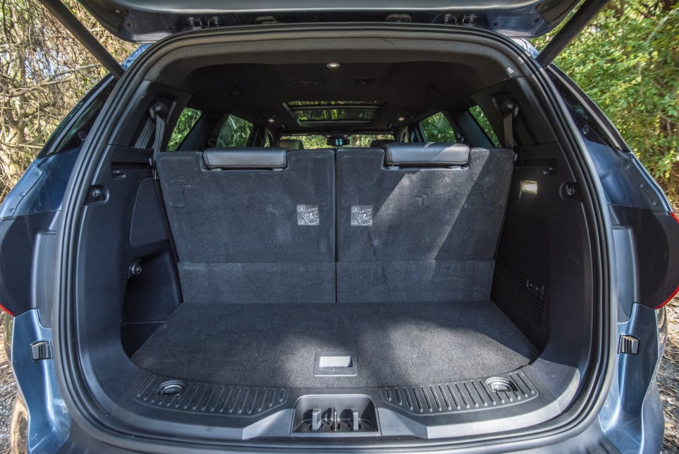 With seven seats up the boot space is reduced to 450L (SAE) (pictured: Ford Everest Titanium).