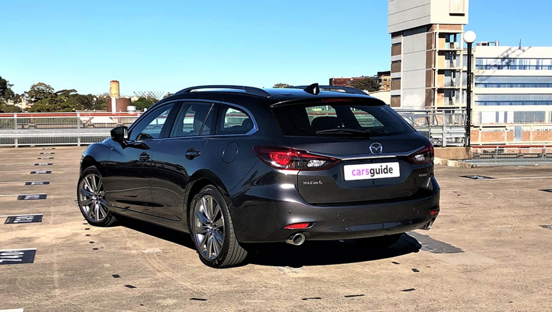 Despite being heckled for driving a Mazda6 wagon to an old-school rod festival, more than a few punters inside wanted to take a look at it. (image: Richard Berry)