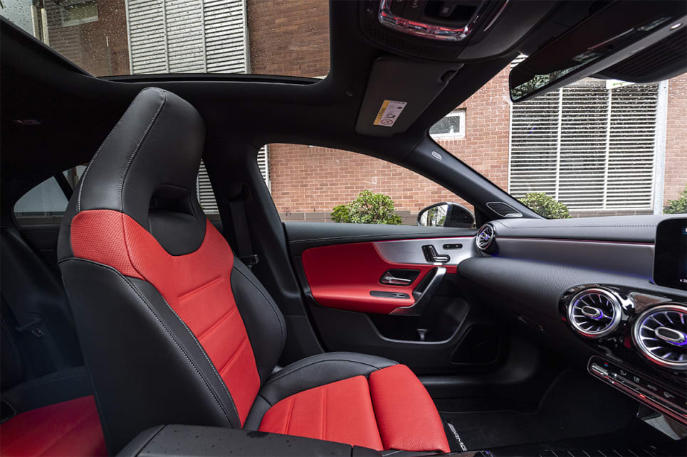 The colour palette continues inside the cabin with red and black Lugano leather used for the seats and doors.