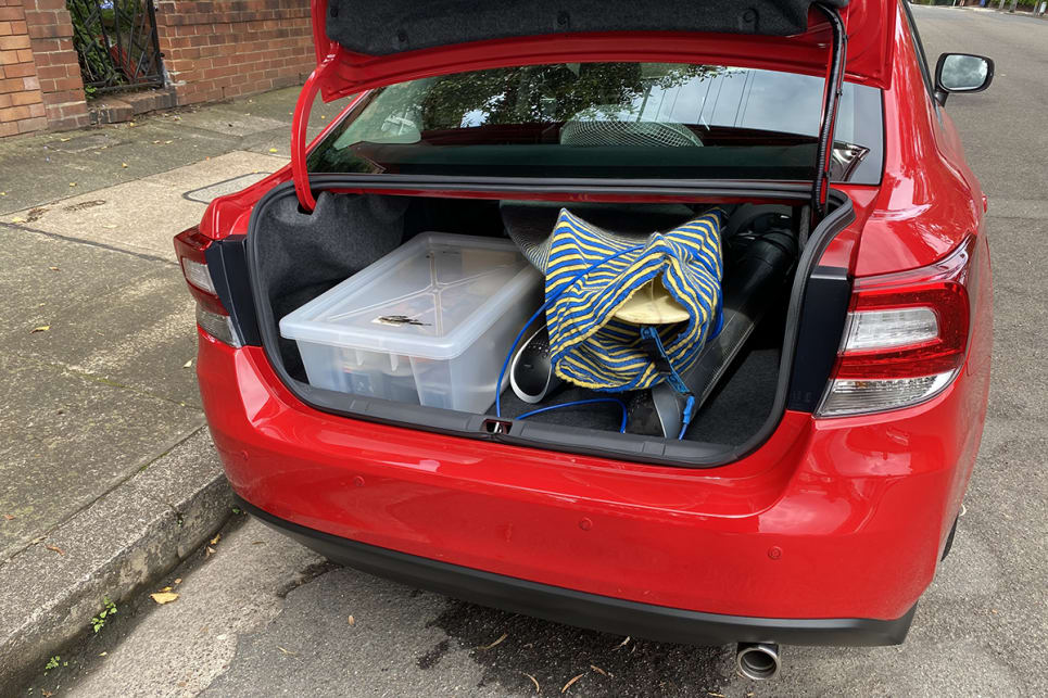 You can still fold the rear seats down in the sedan, which is what I did and loaded the Impreza up with a surprising amount of stuff I needed to clear out of the spare room. (image: Richard Berry)