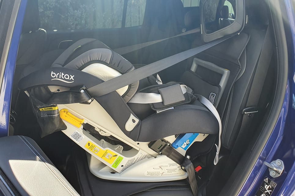 The second row easily fits a rear-facing baby seat.