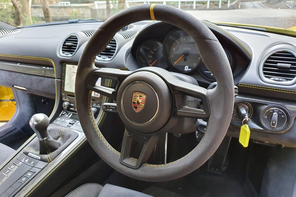 The delightfully round and buttonless steering wheel from the GT3 is wrapped with Alcantara. (image credit: Malcolm Flynn)