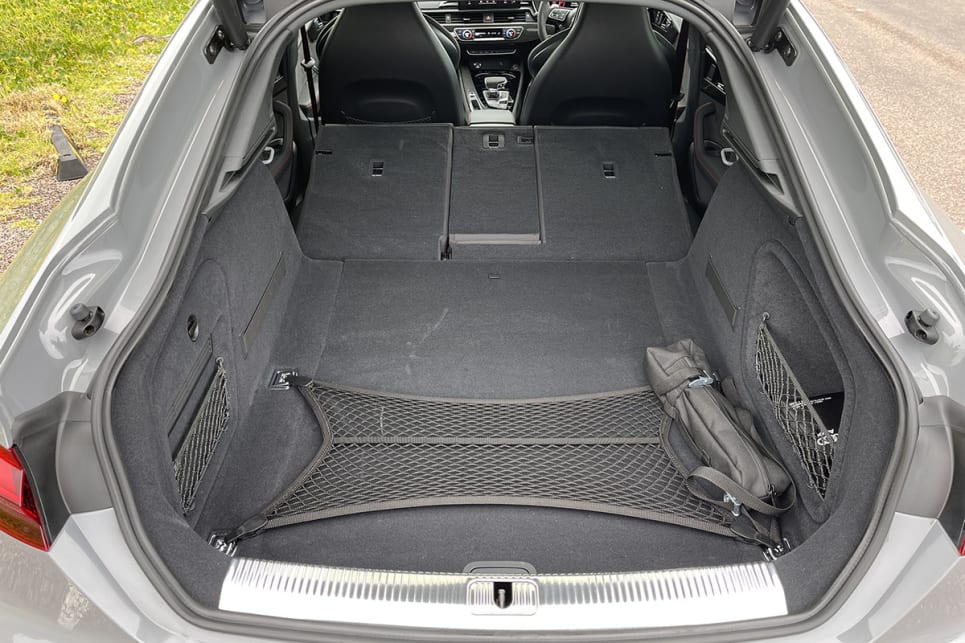You can drop the back seats for a little extra cargo space.