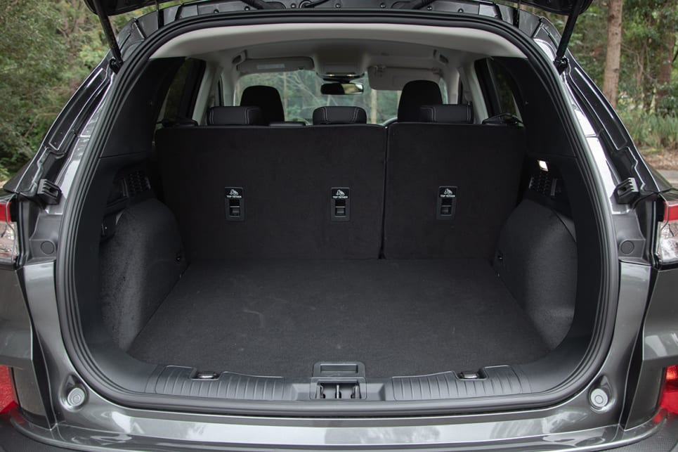 That second row rolls on rails and locks into place and this means boot space can be contracted and expanded between 412 litres and 526 litres. (Escape pictured)