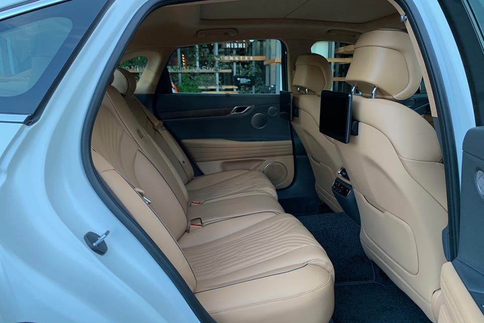 There's ample kneeroom, headroom, shoulder space and toe room in the rear. (3.5T Luxury Pack variant shown)