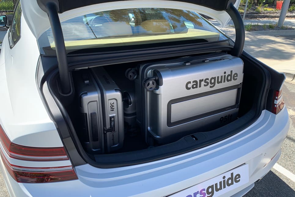 We put in the CarsGuide luggage set and all of them fit. (3.5T Luxury Pack variant shown)