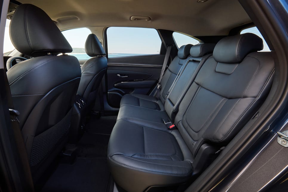 The rear seat space is exceptional for adults. (Elite variant pictured)