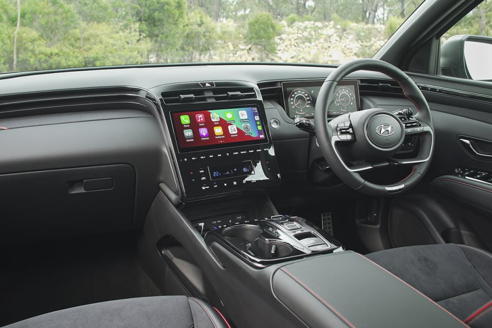 Around the multimedia screen is a swathe of piano black trim. (N-Line variant pictured)