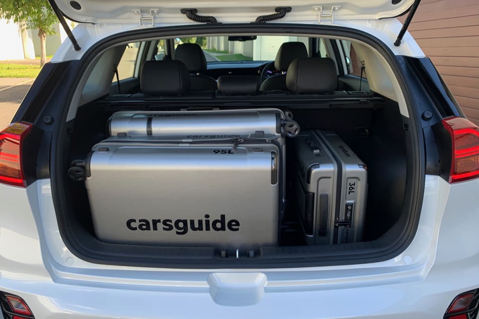 The Niro managed to fit all three CarsGuide suitcases. (image credit: Matt Campbell / HEV Sport variant pictured)