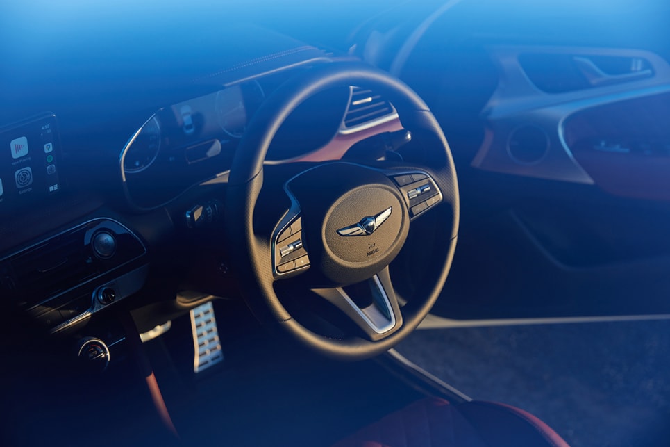 There's a heated steering wheel. (3.3T Sport Luxury Pack variant pictured)