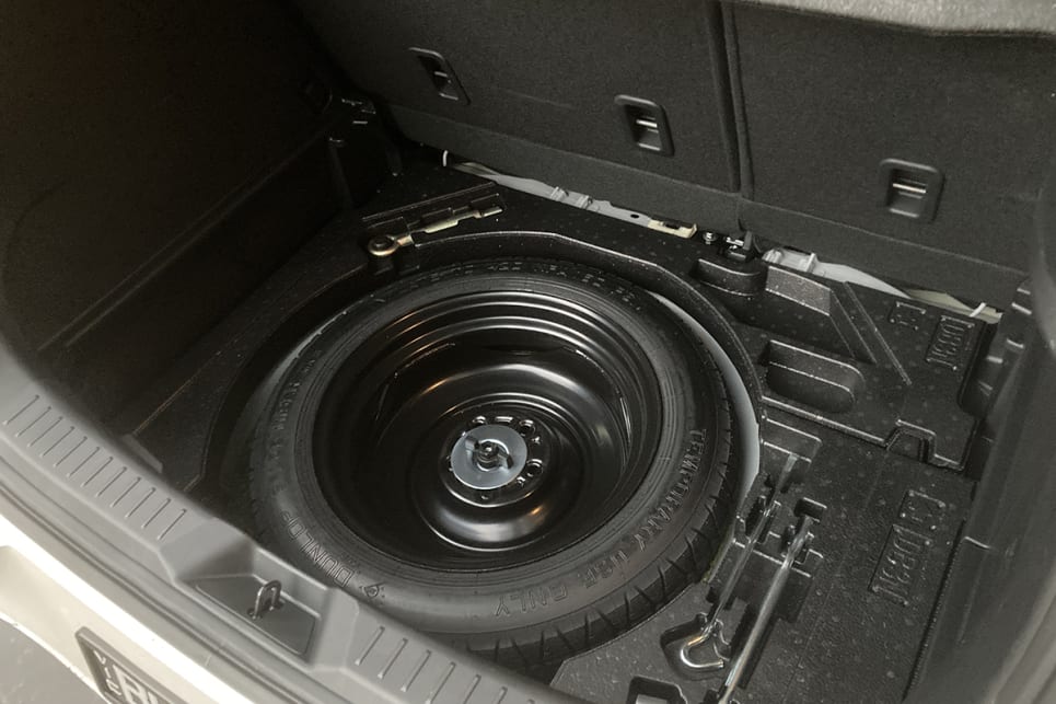 Underneath the boot floor is a space-saver spare wheel.