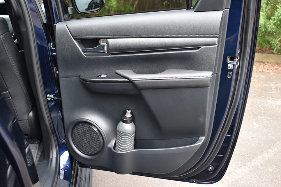 Rear seat passengers get a large-bottle holder and small storage bin in each door.