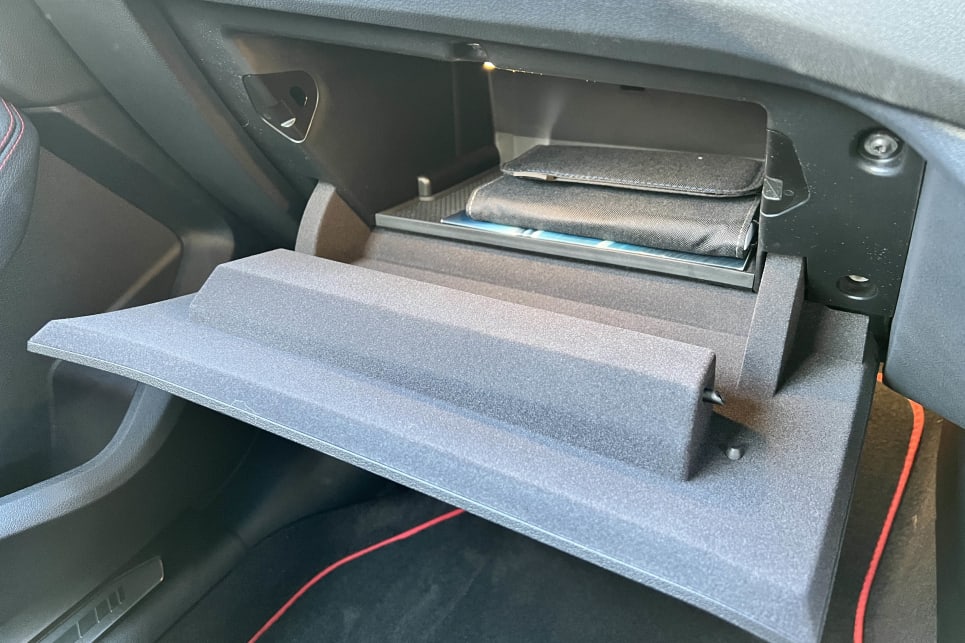 Up front, the glove box is surprisingly large (Image: Justin Hilliard).