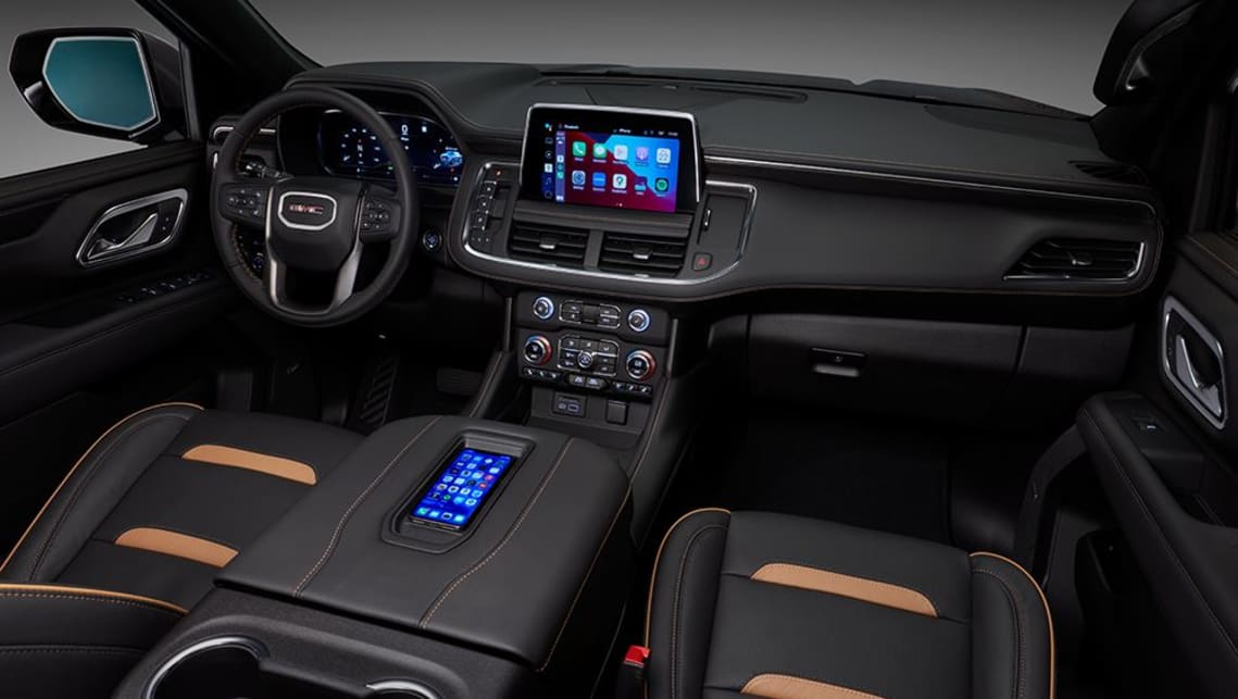 Upfront of the current Yukon is a 10.2-inch media screen and wireless phone charging. (MY22 model pictured)
