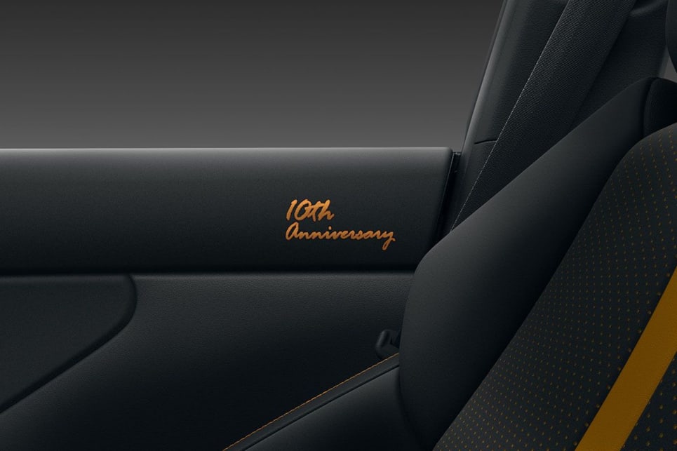 The upper parts of the driver and passenger door trims are embossed with 10th Anniversary embroidery.