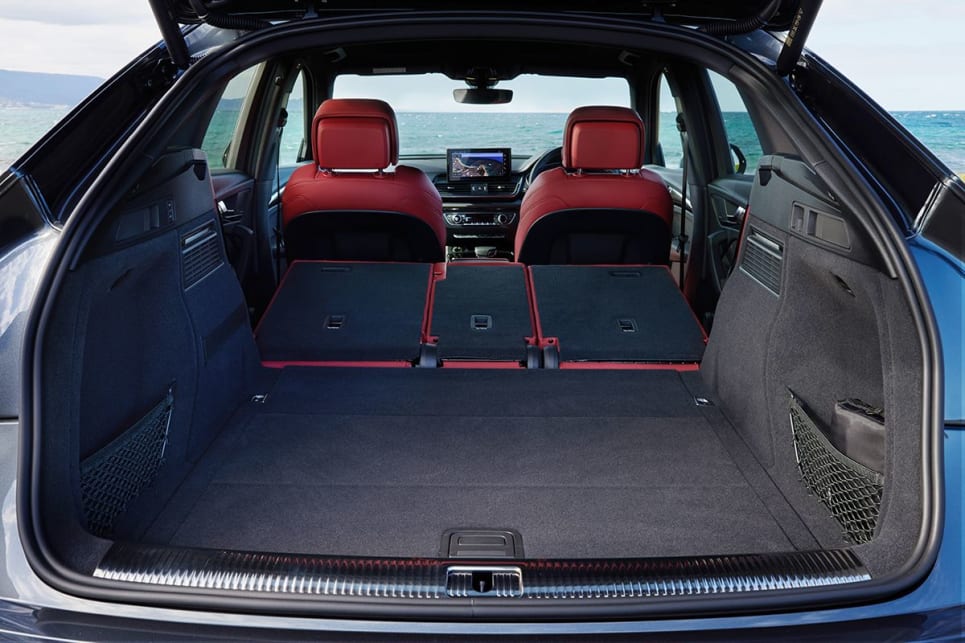 Folding the rear seats flat, increases cargo capacity to 1470 litres. (SQ5 Sportback variant pictured)