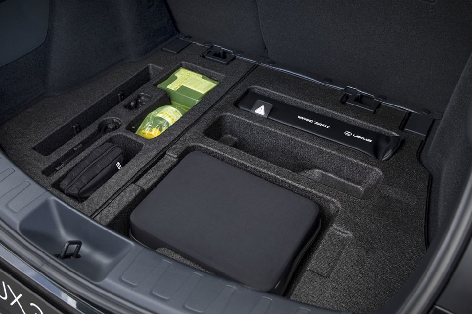 The boot has a solid cargo capacity of 414L (pictured: UX 300e Luxury). 