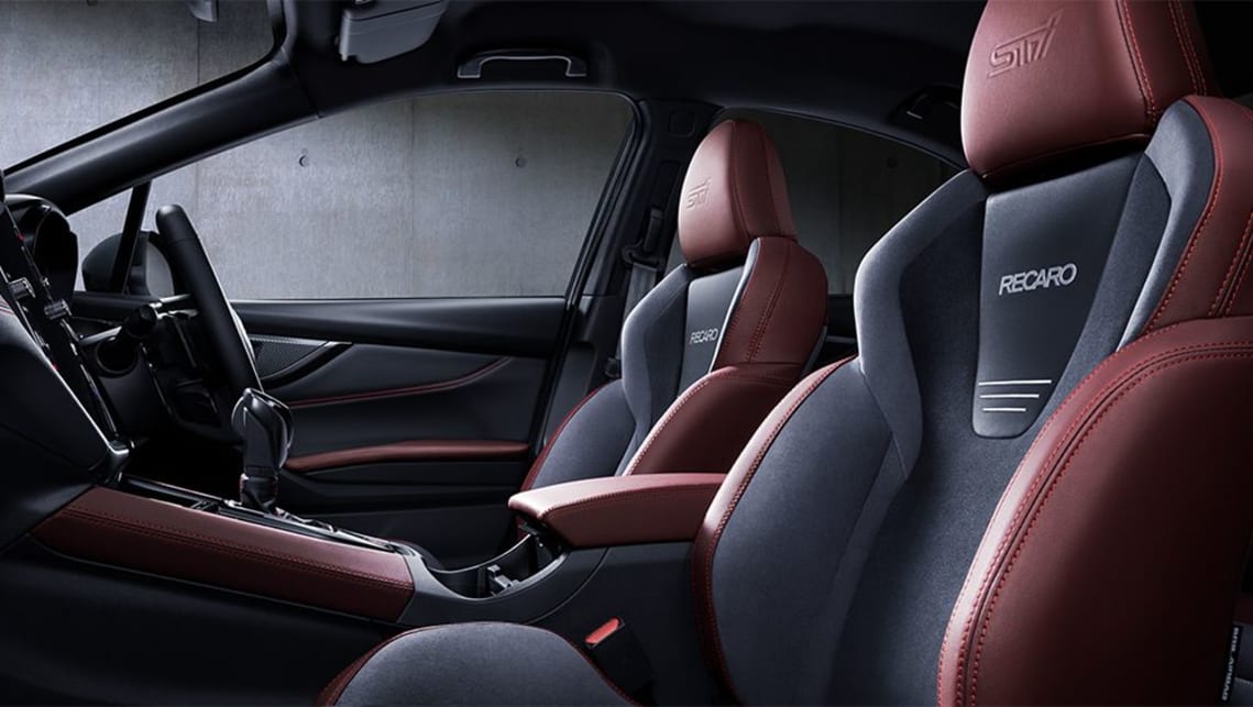 There are red-trimmed Recaro sports seats.