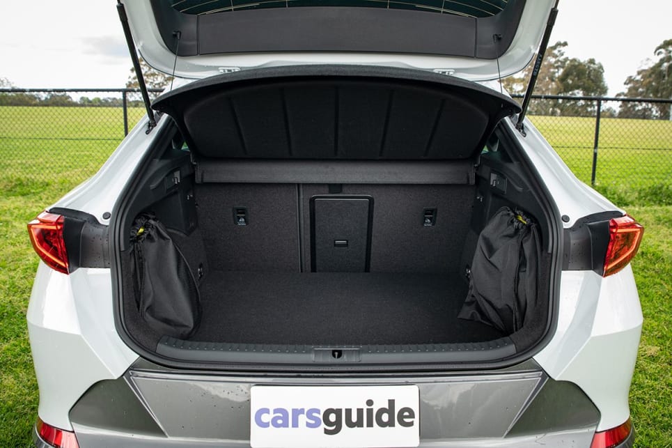 There is no under floor storage with a small cutaway for the tyre repair kit, so you will need to store your charging cables in the boot. (Image: Tom White)