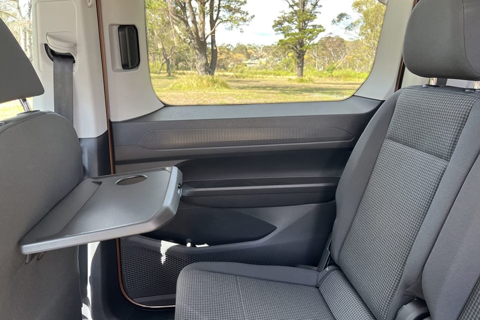 The two outboard passengers also get access to a folding table in each of the front seat-backs. (image: Marcus Craft)