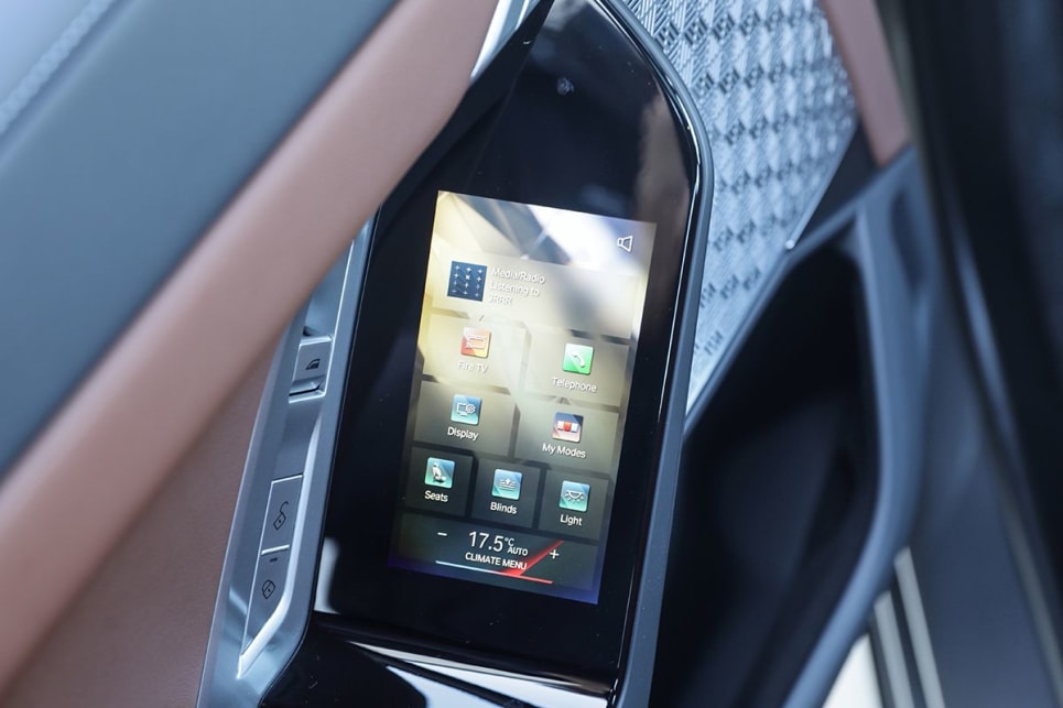 Rea passengers get door-mounted control screens. (i7 xDrive60 variant pictured)