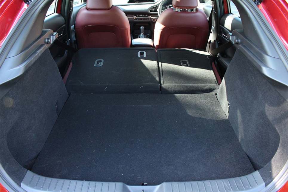 The CX-30s 317-litre boot isn't the most available in the segment, even big trips with three adults can be handled. (Image: John-Paul Beirouty)