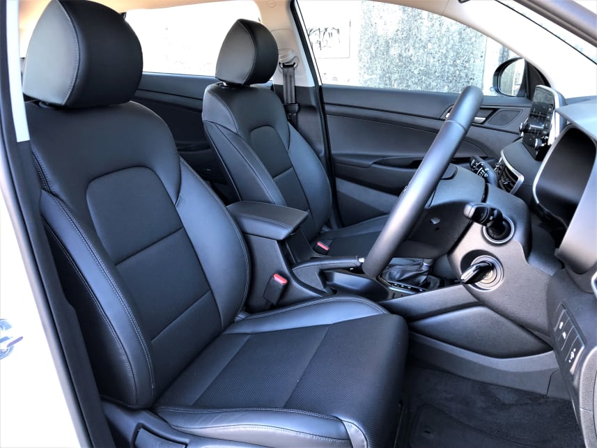 Hyundai Tucson Active X has leather seats. 
