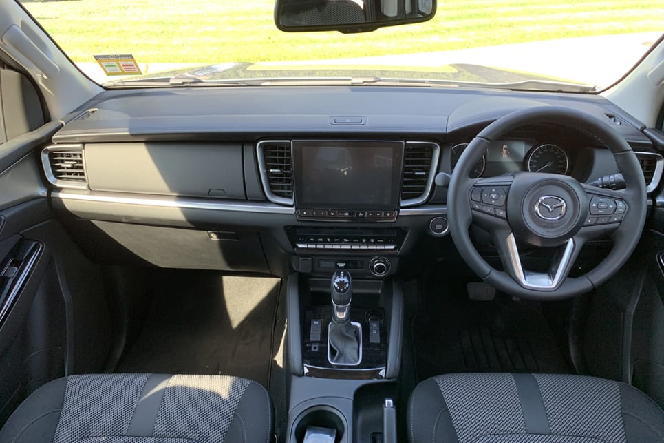 Inside there are a few more notable changes, including dual-zone climate control with rear directional air vents, a leather-wrapped steering wheel and gear selector, and an auto-dimming rearview mirror.