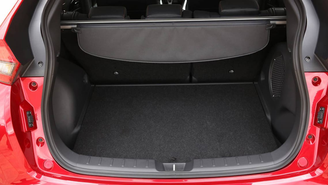 Like Renault and Citroen, Mitsubishi has been a little creative with how you can access cargo space in the Eclipse Cross.