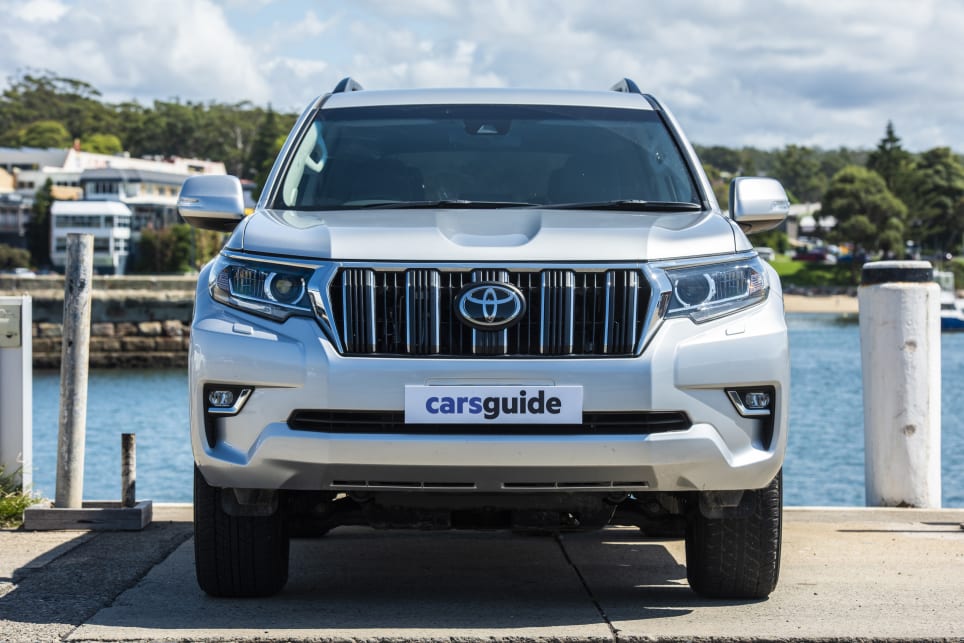 The Prado GXL features a muscular grille.