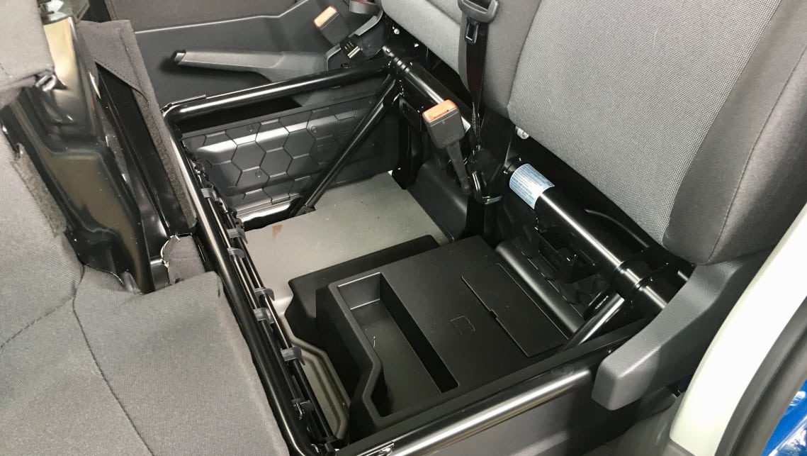 There’s under-seat storage, and a fold-down table in the backrest of the middle seat.