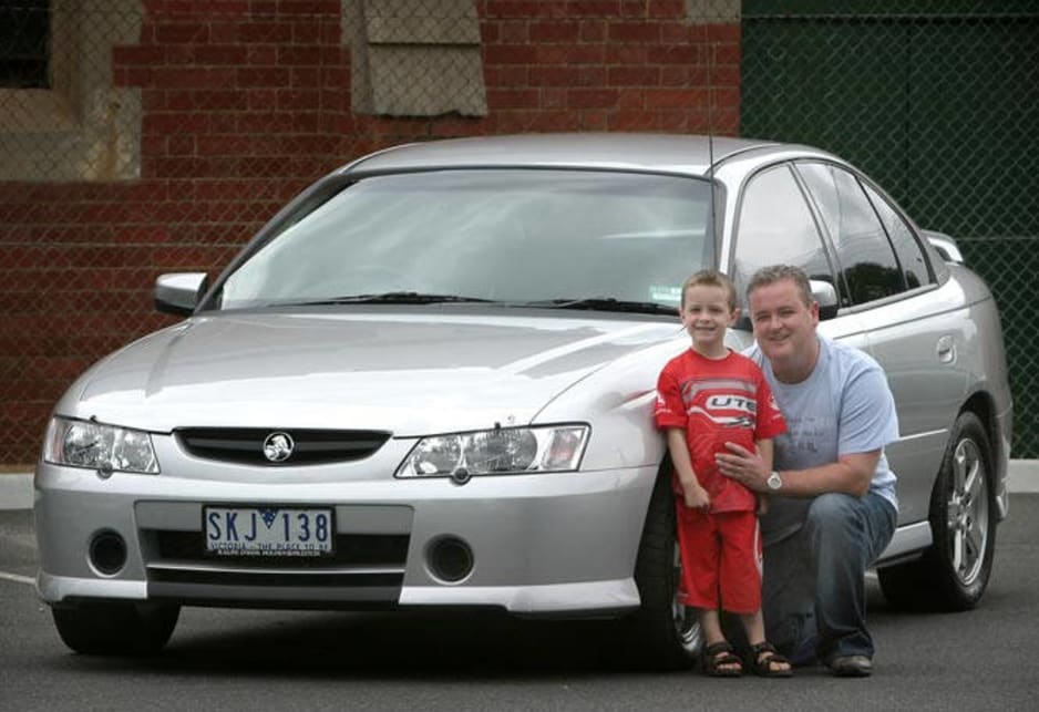 Rod Kidd and his son with the 2003 Holden Commodore VY S 