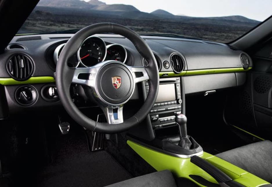 Porsche shaved 55kg off the cars driven at launch in Spain's big island, Majorca. That was achieved by deleting things it saw may be unnecesary - things like the airconditioner, radio, standard seats, cupholders, door handles and door trim.