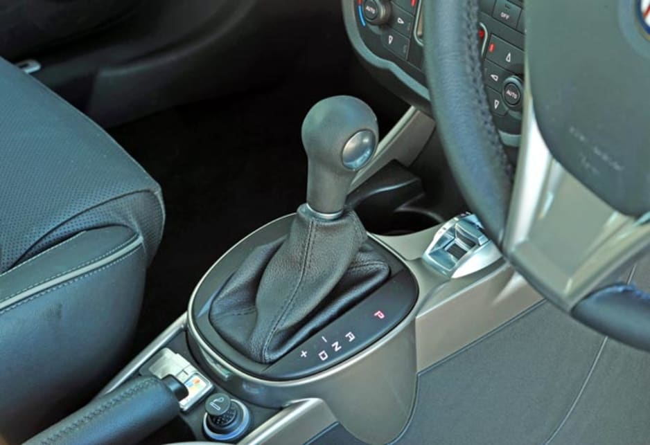 The six-speed gearbox is a twin-clutch arrangment with electronic engagement (hence no clutch pedal). It's variously called DSG, Powershift and S-tronic by other companies.