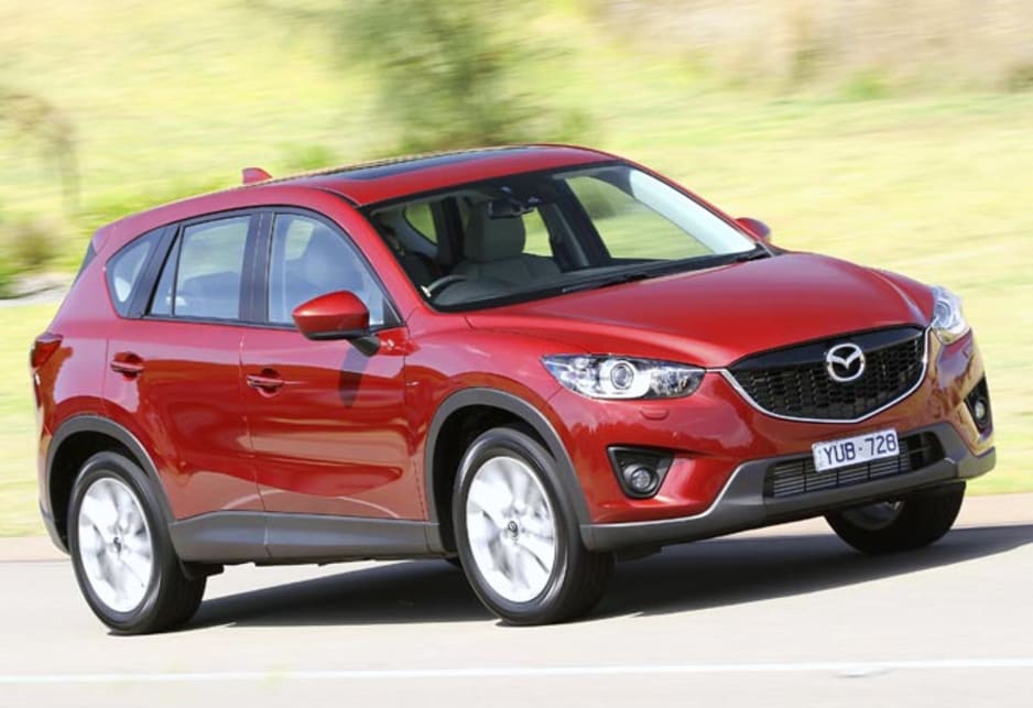 The styling is, unfortunately, a bit predictable as Mazda strives to appease all possible buyer types. The CX-5 is bigger in the flesh that you'd think, thanks to subtly chamfered edges, abrupt and high tail and the wedge-shape of the side glass.