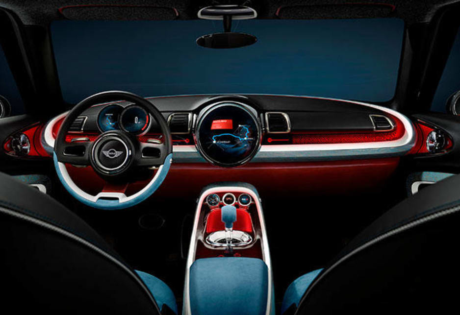 The interior looks further from production reality than the exterior. A large circular display dominates the dashboard as in all recent Minis, while the dash itself is a round shape similar to an aircraft wing, giving the cabin an open and airy feeling.