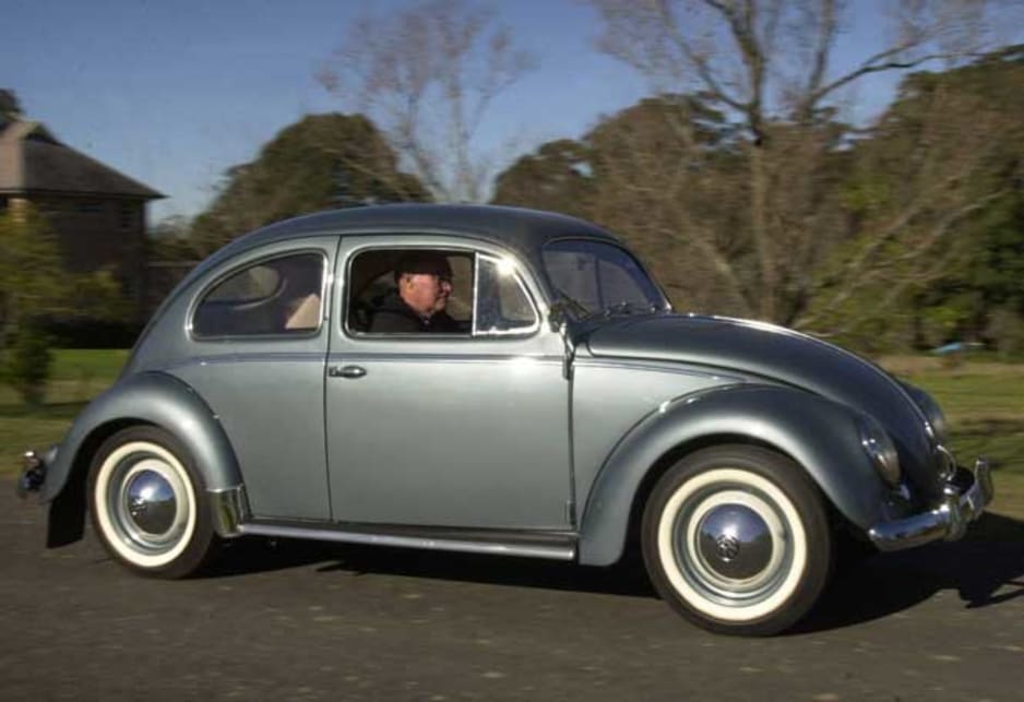 1953 VW Beetle with Ray Black behind the wheel