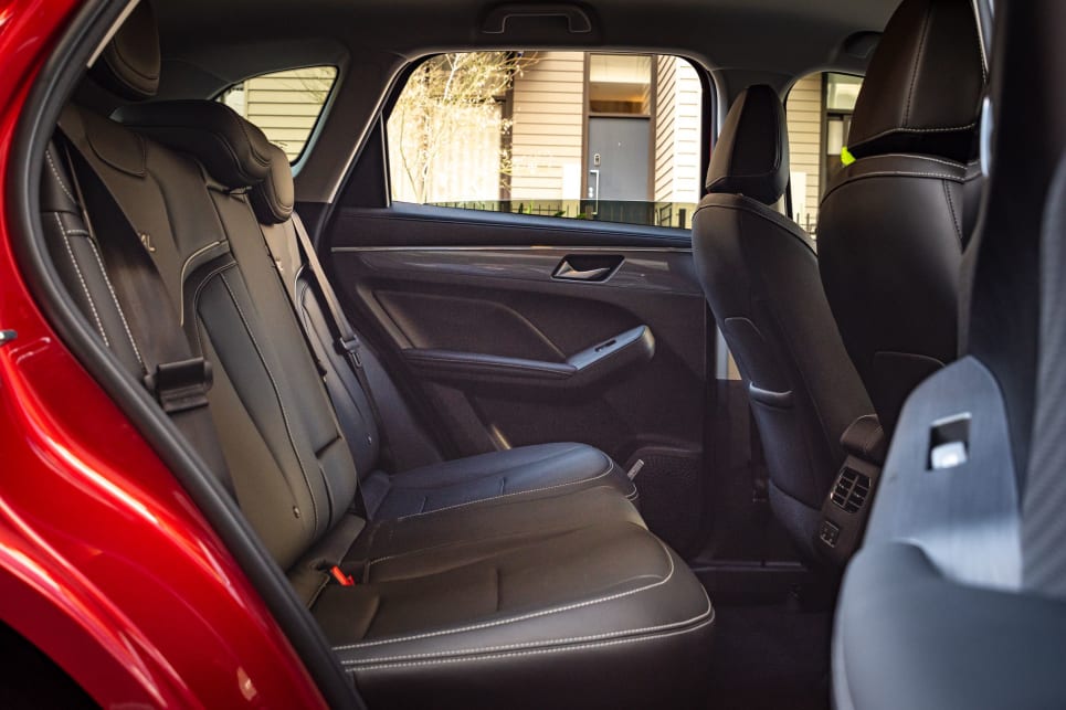  The rear seat deserves special mention as it offers both impressive space for adults and generous amenities, too. (Image: Tom White)
