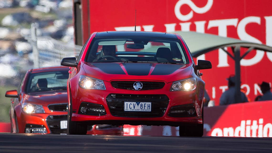 The limited edition Craig Lowndes SS V Special Edition Commodore being driven around Mount Panorama by Joshua Dowling.
