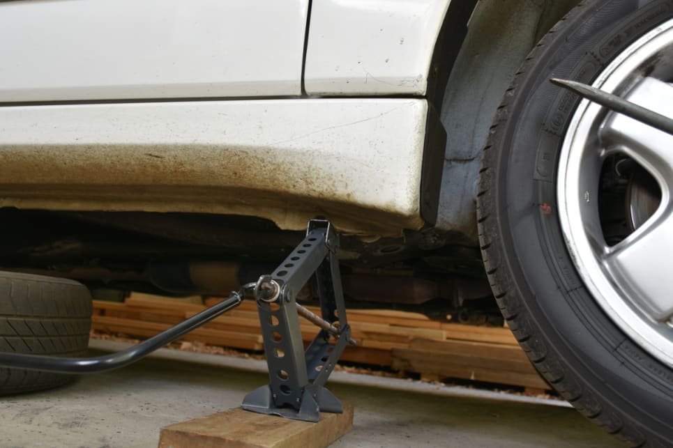 Make sure the jack is positioned correctly under the sill of the car.