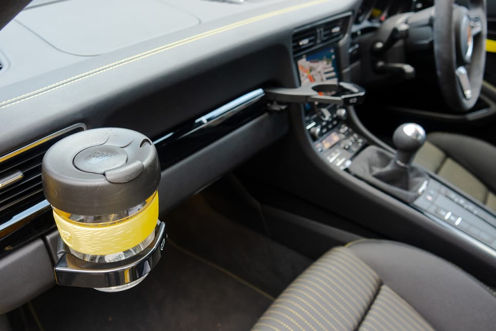 The Carrera comes with industry-best cupholders, but no bottle holders in the doors.