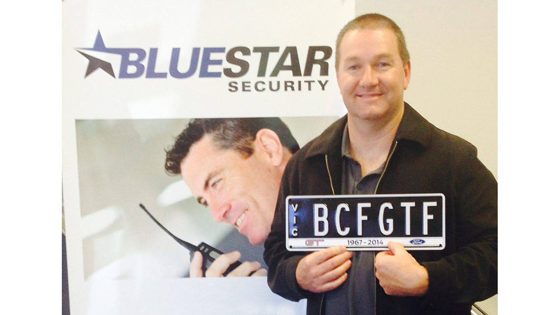 Steve Clarke with the number plate he'll use on the last Ford Falcon GT F, with the initials BCF referring to the Breast Cancer Foundation.  